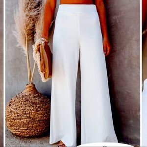 White flare pants